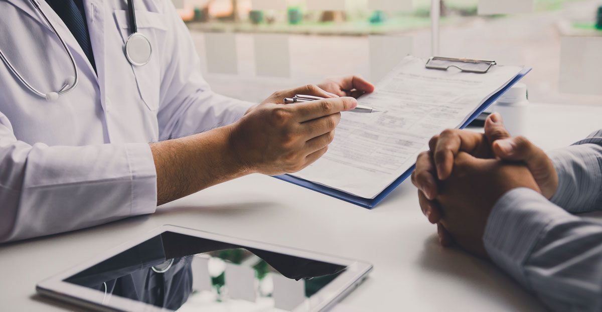 Doctor-discussing-medical-results-with-patient Doctor-discussing-medical-results-with-patient