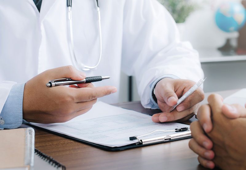 Doctor-discussing-treatment-options-with-patient Doctor-discussing-treatment-options-with-patient
